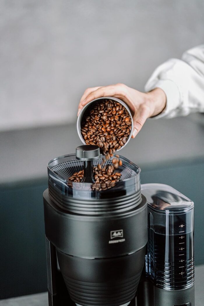 Melitta AromaFresh X – Filterkaffeemaschine mit integriertem Mahlwerk, Glaskanne und Timer-Funktion, für bis zu 10 Tassen Kaffee, in Schwarz/silber
